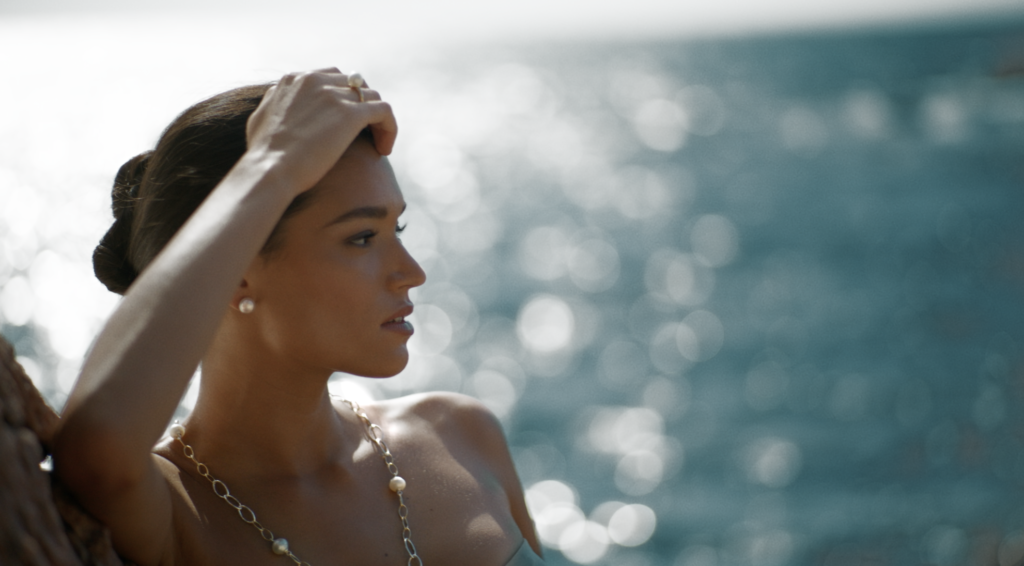 Brisbane Colourist Angela Cerasi colour graded this shot of model/ muse Aude Mangharam wearing statement pieces of Kailis Jewellery as she lies on the beach, for the "RISE Act IV" TVC campaign for Kailis Jewellery