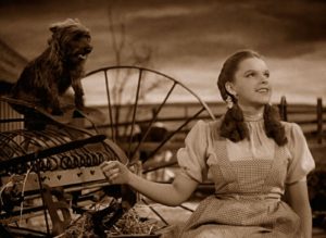 Sepia tinted image of Dorothy and Toto from the film "The Wizard of Oz"