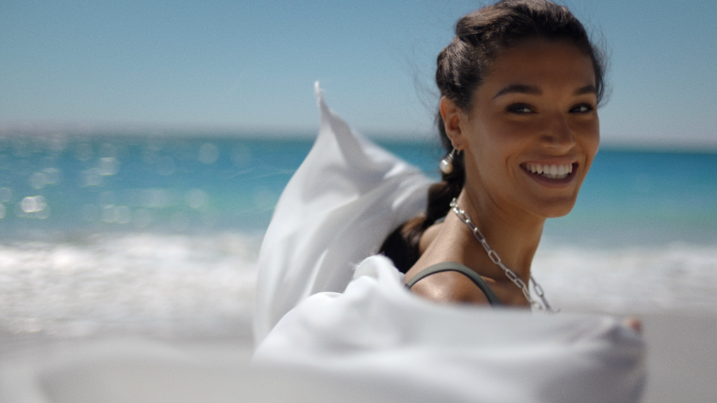 2023 Wrap - Brisbane Colourist Angela Cerasi colour graded this shot of model/ muse Aude Mangharam wearing statement pieces of Kailis Jewellery as she runs down the beach, for the "RISE Act IV" TVC campaign for Kailis Jewellery