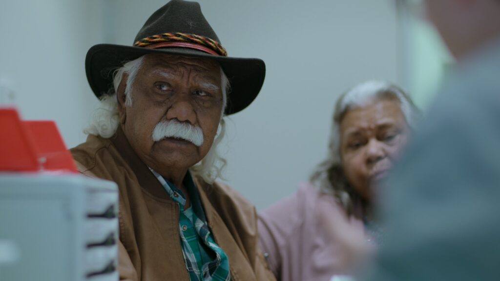 Australian Documentary Colour Grade image of Yurlu | Country, graded by Senior Colourist Angela Cerasi, image of Indigenous Australian Maitland Parker and another woman