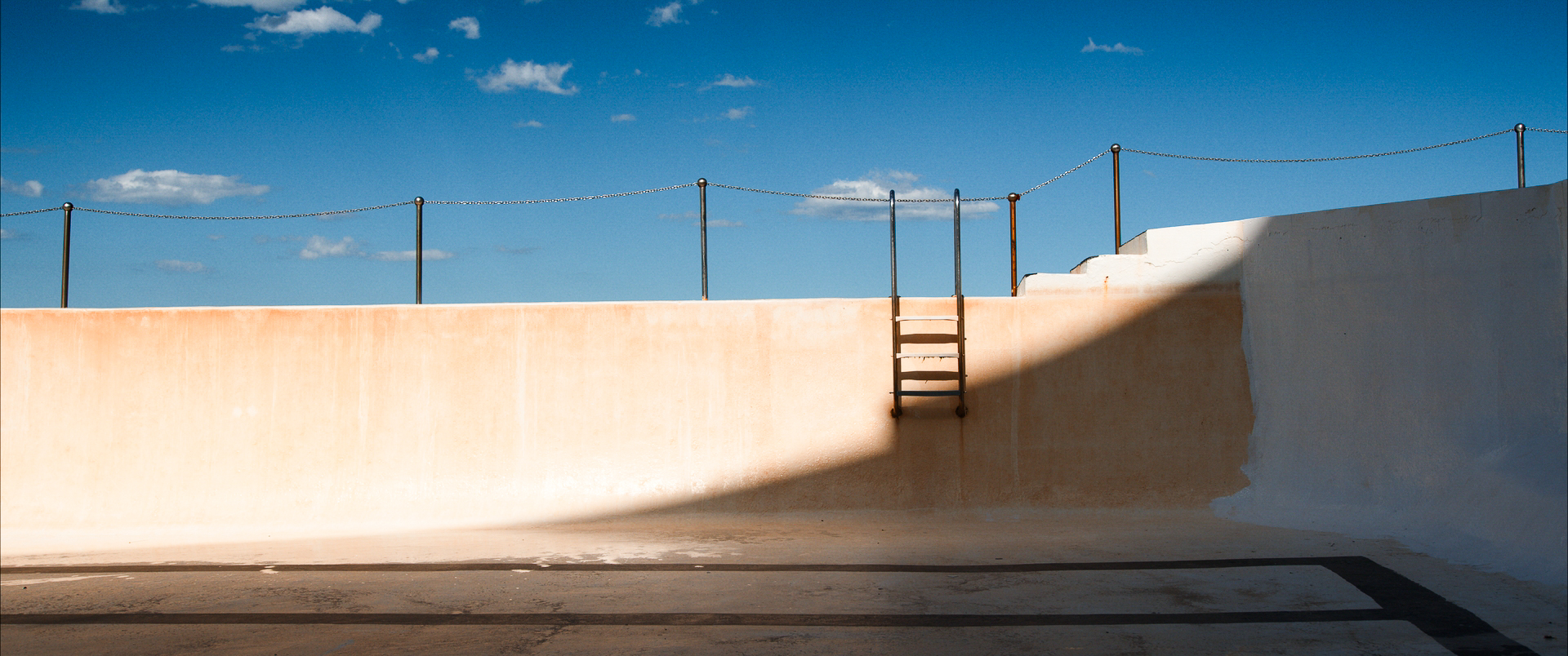 Image of an empty pool, graded by Angela Cerasi
